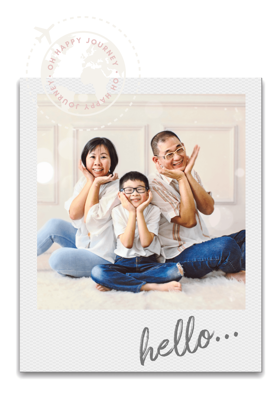 Mother, son, and father sitting on the floor for a family picture